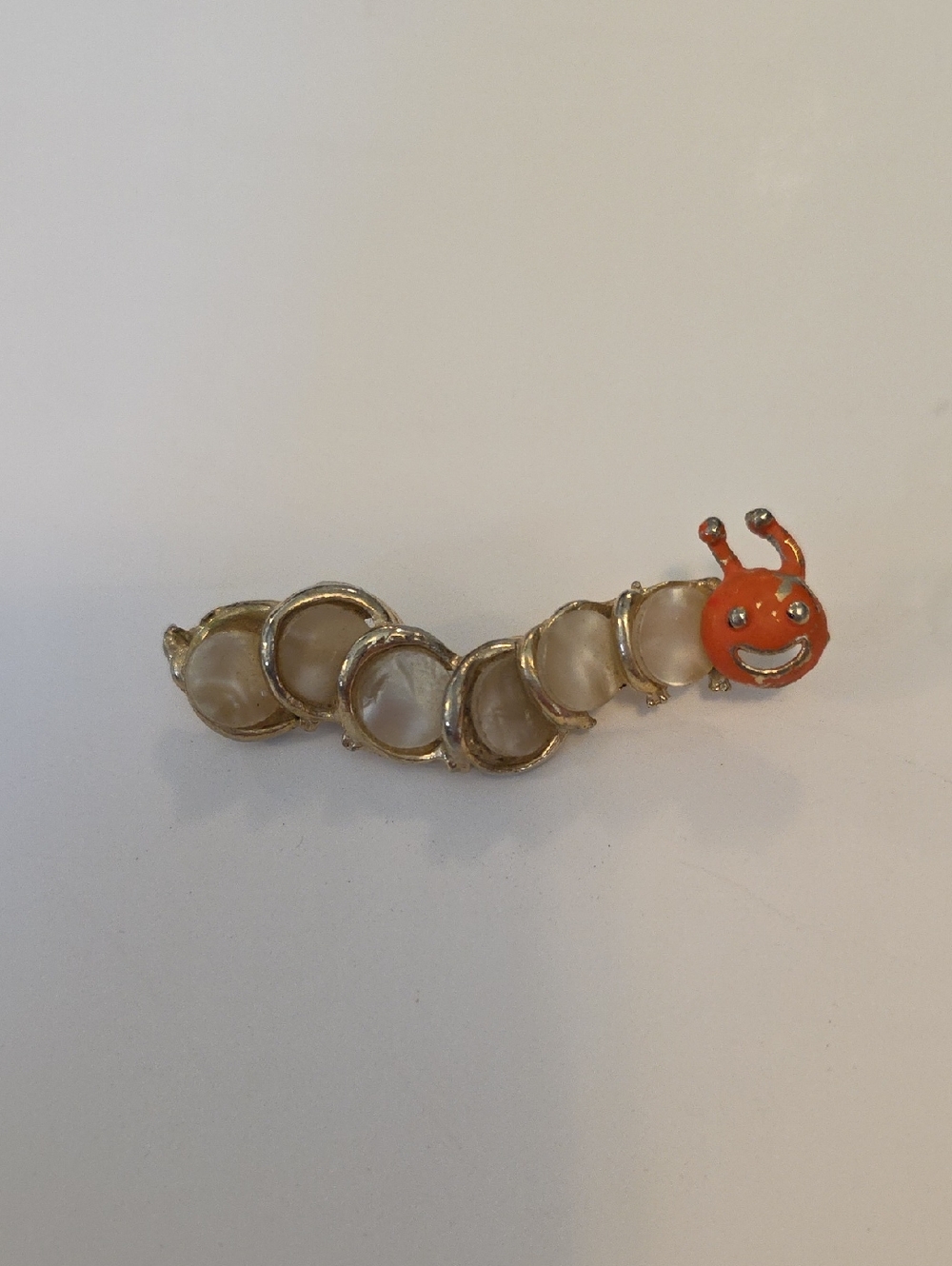 Gold-Tone Mother-of-Pearl Cabachon Caterpillar Brooch with Orange Head 80's